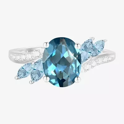 Womens Genuine Blue Topaz Sterling Silver Oval Side Stone Cocktail Ring