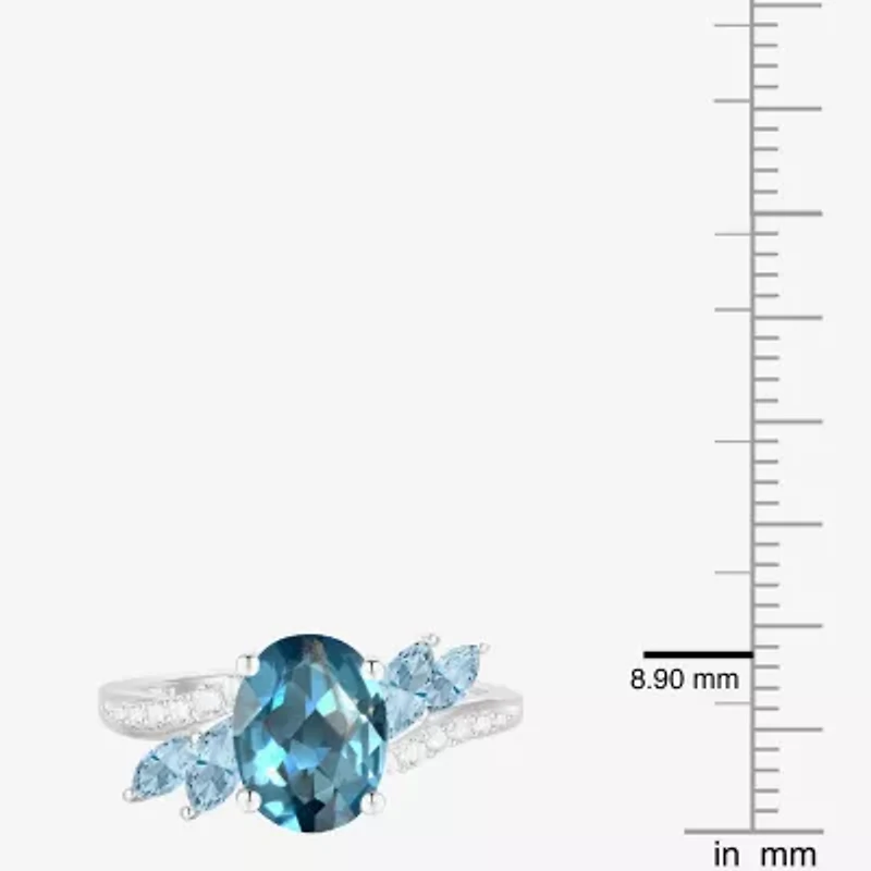 Womens Genuine Blue Topaz Sterling Silver Oval Side Stone Cocktail Ring