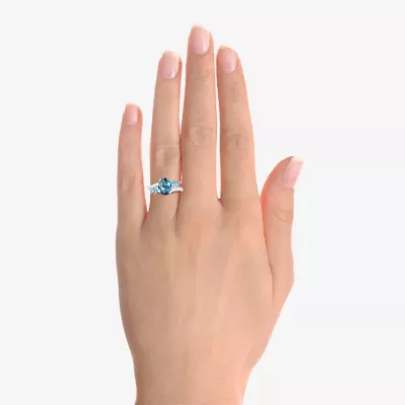 Womens Genuine Blue Topaz Sterling Silver Oval Side Stone Cocktail Ring