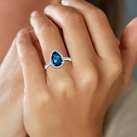 Womens Genuine Blue Topaz Sterling Silver Pear Halo Side Stone Cocktail Ring
