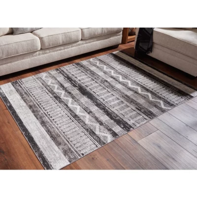 Signature Design by Ashley® Henchester Washable Indoor Rectangular Area Rug