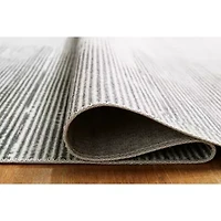 Signature Design by Ashley® Milset Washable Indoor Rectangular Area Rug