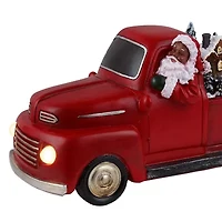 African American Santa In Red Truck Animated Figurine