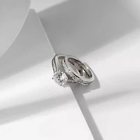 Diamonart Womens Cubic Zirconia Sterling Silver Round Side Stone Engagement Ring