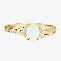 (J-K/I2-I3) Womens Gemstone and 1/10 CT. T.W. Natural Diamond 10K Gold Oval Side Stone Cocktail Ring
