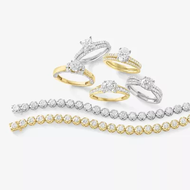 (H-I / Si2-I1) Womens 1 1/2 CT. T.W. Lab Grown White Diamond 10K or 14K Gold Oval Side Stone Bridal Set