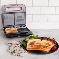 Uncanny Brands Jurassic Park Grilled Cheese Maker- Panini Press and Compact Indoor Grill- Opens 180 Degrees