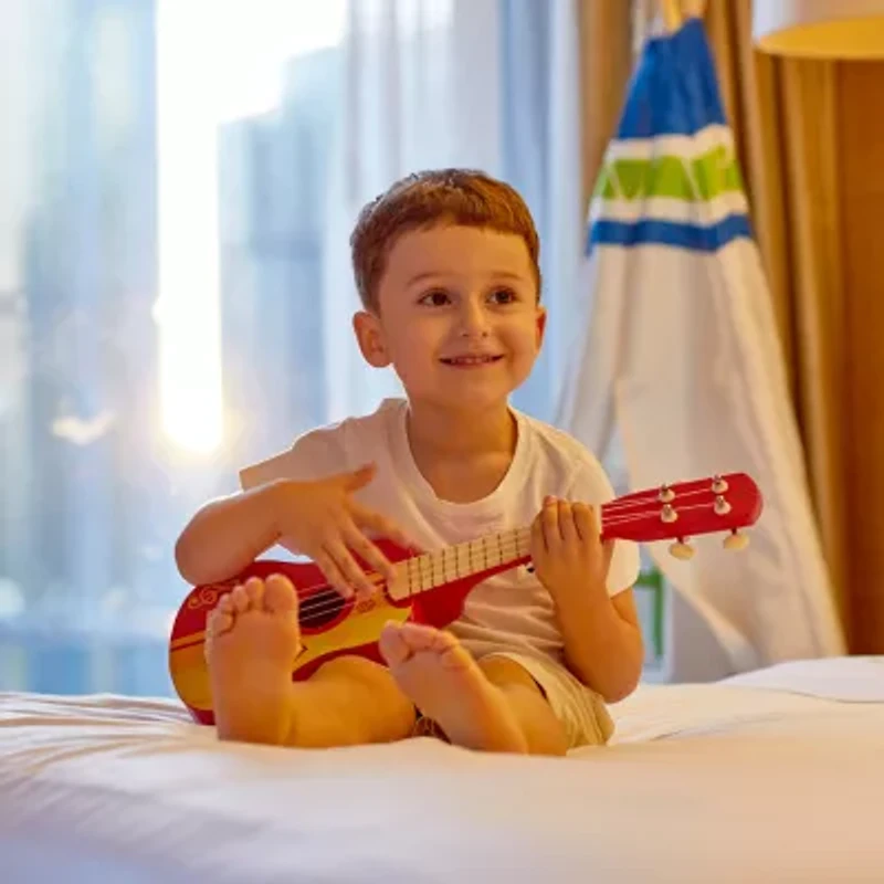 Hape Kids Toy Ukulele - Red & Yellow Musical Instrument