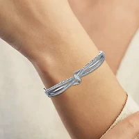 1/10 CT. T.W. Diamond Crossover Bangle Bracelet Sterling Silver or 14K Gold Over