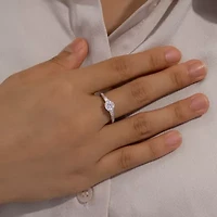 Diamonart Womens Cubic Zirconia Sterling Silver Round Side Stone Engagement Ring