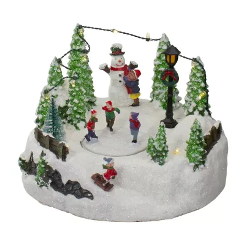 Northlight 9in Scene With Moving Skaters And A Snowman Plays Music Christmas Village