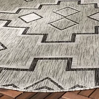 Safavieh Courtyard Collection Ambrose Geometric Indoor/Outdoor Round Area Rug
