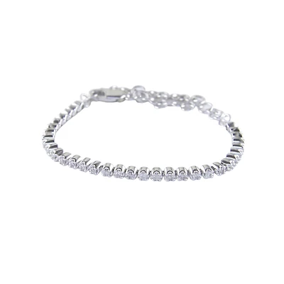 10K WHITE GOLD TENNIS BRACELET.