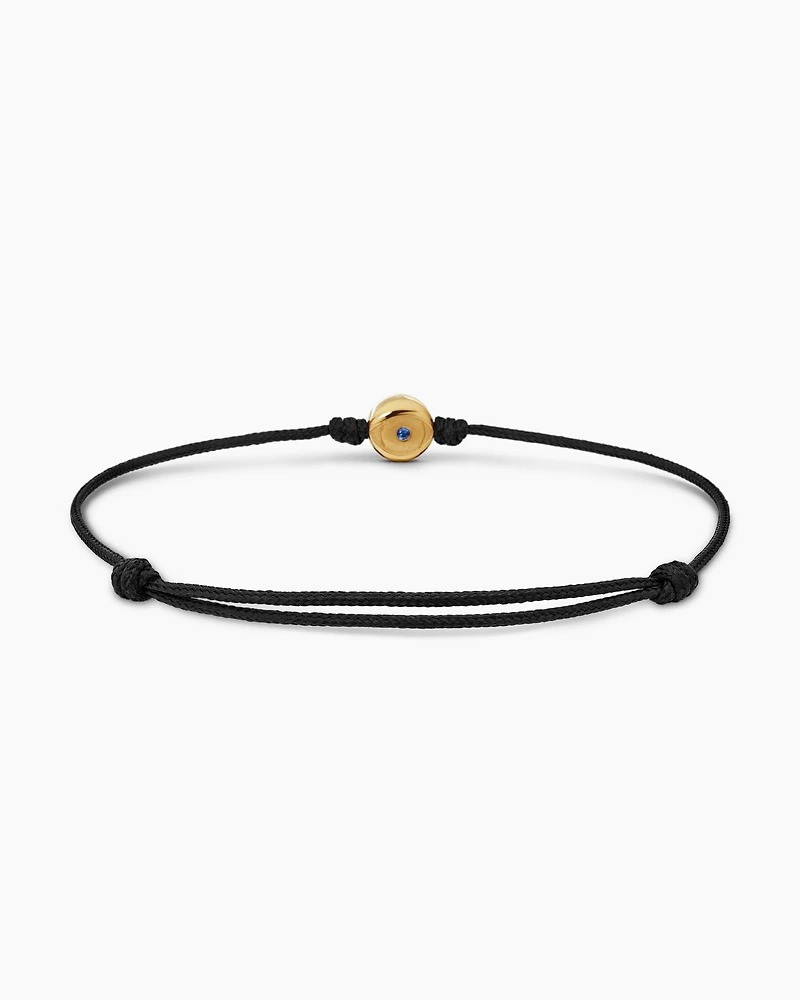 Evil Eye Cord Bracelet in Black Nylon with 18K Yellow Gold and Sapphire, 7.7mm