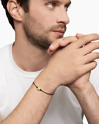 Evil Eye Cord Bracelet in Black Nylon with 18K Yellow Gold and Sapphire, 7.7mm
