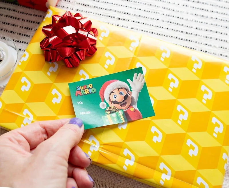 Super Mario 9-Piece Holiday Wrapping Paper Kit 3 Sheets, 3 Gift Tags, 3 Bows