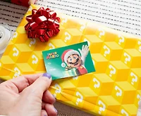 Super Mario 9-Piece Holiday Wrapping Paper Kit 3 Sheets, 3 Gift Tags, 3 Bows