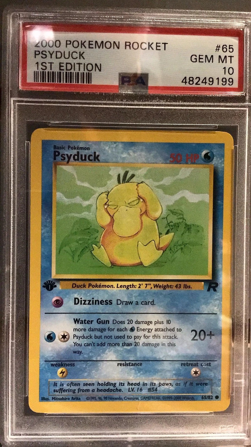 2000 Pokemon Rocket 65 Psyduck 1st Edition PSA