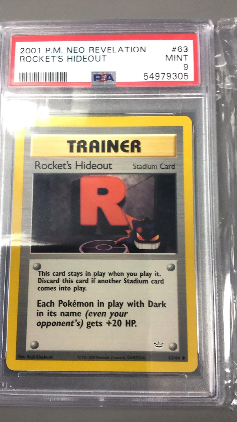 2001 Pokemon Neo Revelation 63 Rocket's Hideout PSA 9