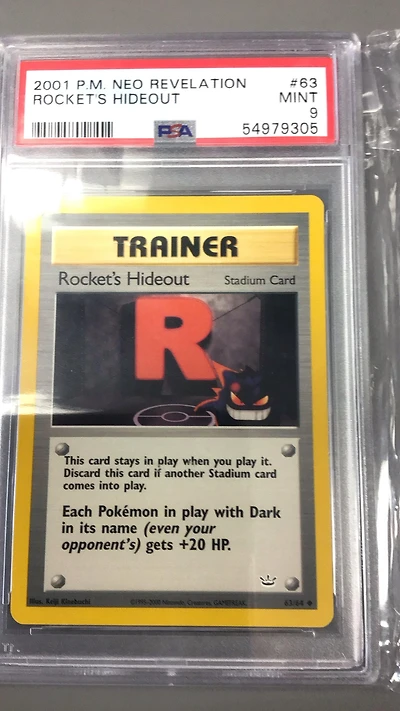 2001 Pokemon Neo Revelation 63 Rocket's Hideout PSA 9