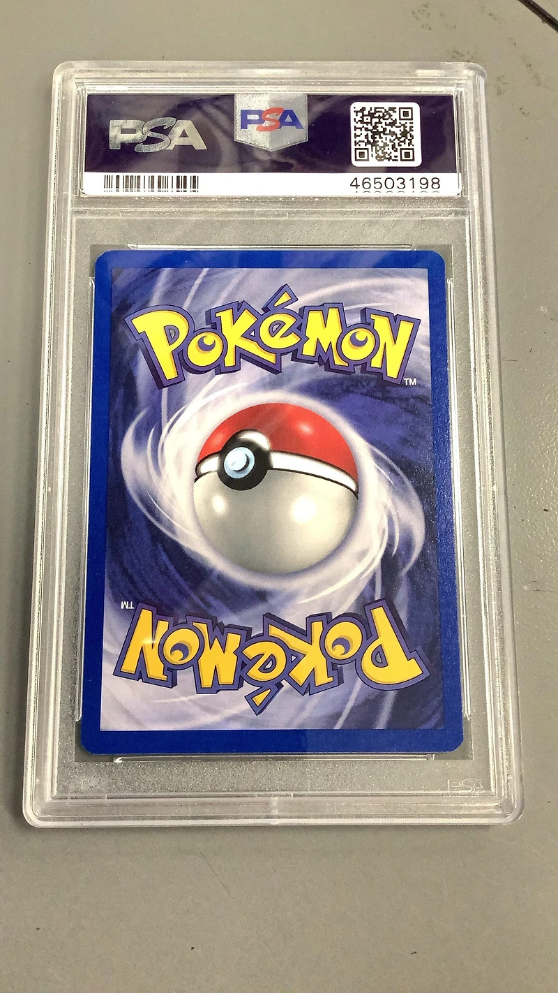 2000 Pokemon Gym Heroes 11 Rocket's Hitmonchan Holo PSA
