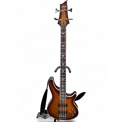 Used Schecter Guitar Research Omen Extreme 4 String 2 Color Sunburst Electric Bass Guitar