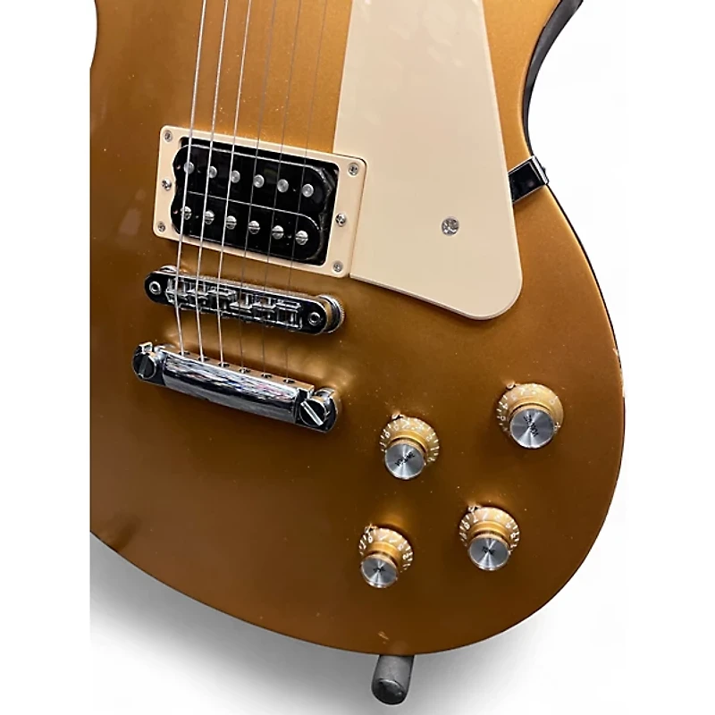 Used 2016 Gibson Les Paul Tribute Gold Top Solid Body Electric Guitar