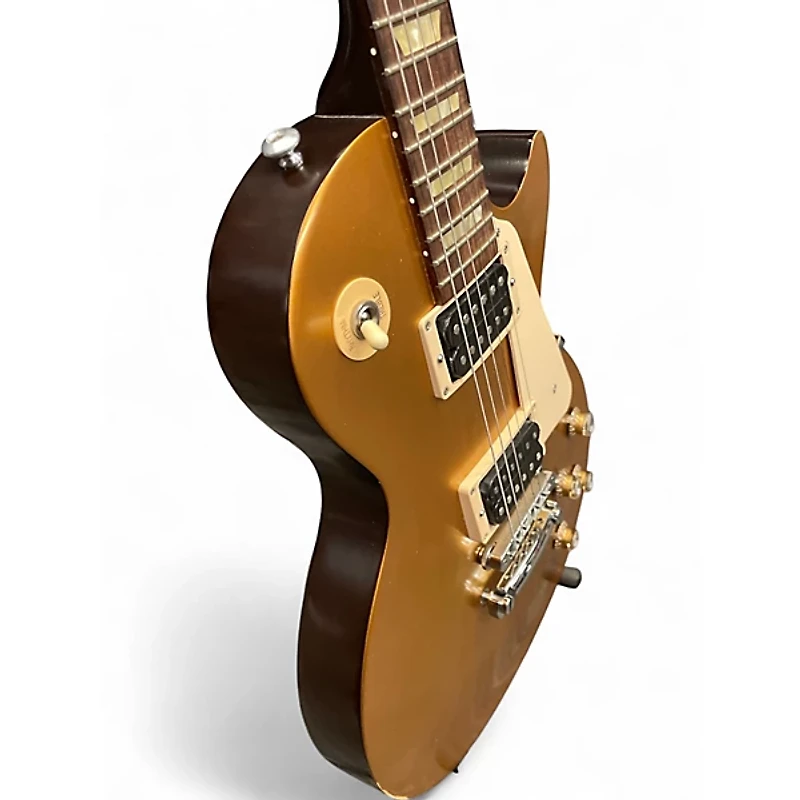 Used 2016 Gibson Les Paul Tribute Gold Top Solid Body Electric Guitar
