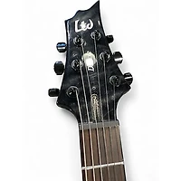 Used ESP LTD MH1000 Deluxe Trans Black Solid Body Electric Guitar