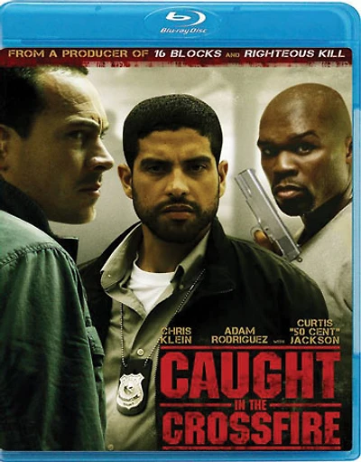 Caught in the Crossfire - USED