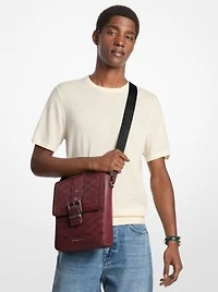 Colby Logo Embossed Burnished Leather Messenger Bag