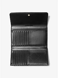 Jet Set Travel Large Quilted Tri-Fold Wallet
