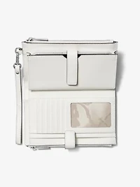 Jet Set Travel Large Embellished Signature Logo Wristlet