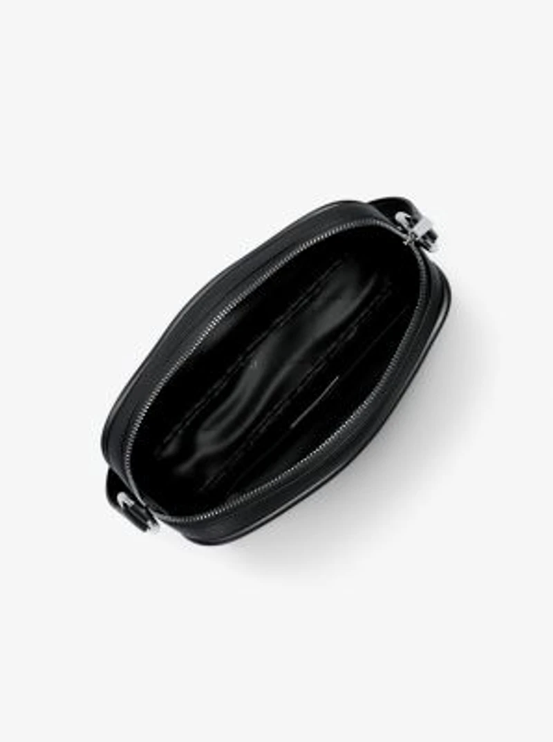 Jet Set Travel Large Logo Debossed Camera Crossbody Bag