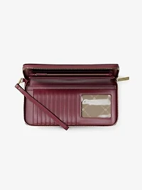 Jet Set Travel Large Pebbled Leather Wristlet