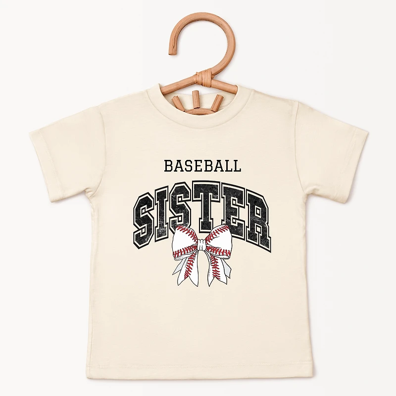 The Juniper Shop - Baseball Sister Varsity Coquette Toddler Short Sleeve Graphic T-Shirt