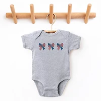 The Juniper Shop - Patriotic Bows Row Baby Short Sleeve Graphic Bodysuit