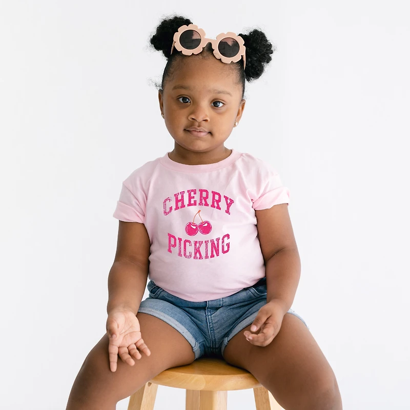 The Juniper Shop - Cherry Picking Varsity Arched Toddler Short Sleeve Graphic T-Shirt