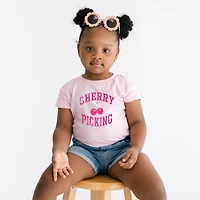 The Juniper Shop - Cherry Picking Varsity Arched Toddler Short Sleeve Graphic T-Shirt