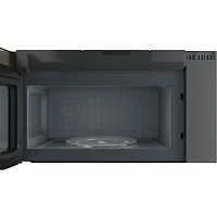 Four à micro-ondes à hotte intégrée SpaceMaker Profile de GE - 2,1 pi3 - Ardoise