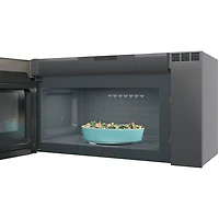 Four à micro-ondes à hotte intégrée SpaceMaker Profile de GE - 2,1 pi3 - Ardoise