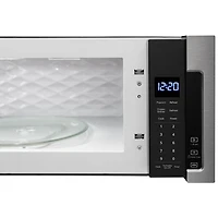 Four à micro-ondes à hotte intégrée de Whirlpool - 1,1 pi