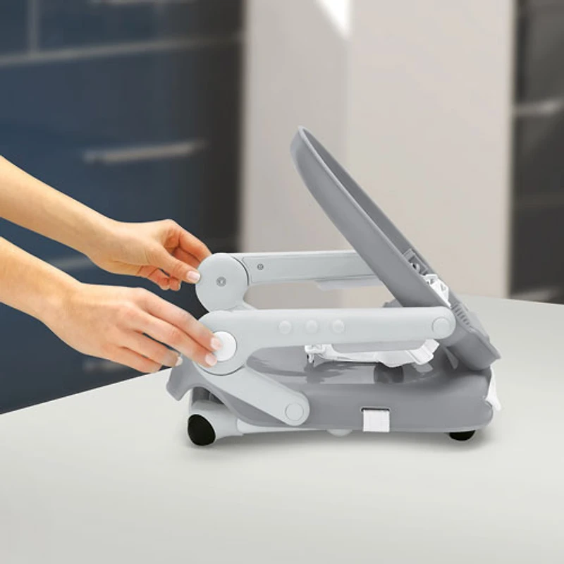 Siège rehausseur pliable Pocket Snack de Chicco avec plateau - Gris