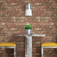 Papier peint autocollant à motif de briques West End de NuWallpaper - Rouge