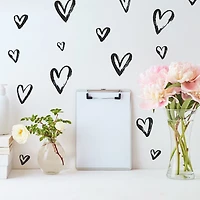 Décalcomanies murales adhésives de coeurs dessinés de RoomMates