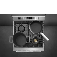 Cuisinière à induction autonome à convection véritable 2,8 pi³ 24 po de Smeg (SPR24UGGX) - Inox