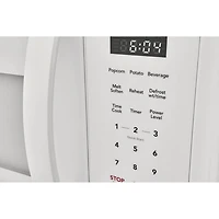 Four à micro-ondes à hotte intégrée de Frigidaire - 1,8 pi³ - Blanc