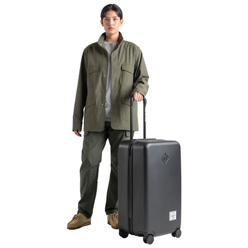 Valise rigide de 27,17 po Heritage de Herschel - Noir