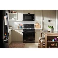 Cuisinière au gaz autonome 30 po avec 5 brûleurs, ventilateur à convection, friture à air chaud et four de 5 pi³ de Whirlpool (WFGS5030RB) - Noir