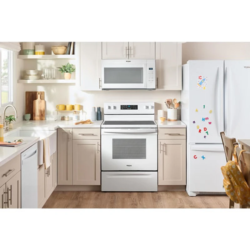 Four à micro-ondes à hotte intégrée de Whirlpool - 1,7 pi³ - Blanc
